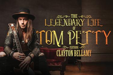 Musician Clayton Bellamy holding a guitar replicating Tom Petty. 